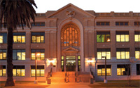 An evening view of Isaac Delgado Hall on the City Park Campus.
