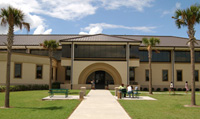 A sunny photo showing the front of a major building on the Westbank campus