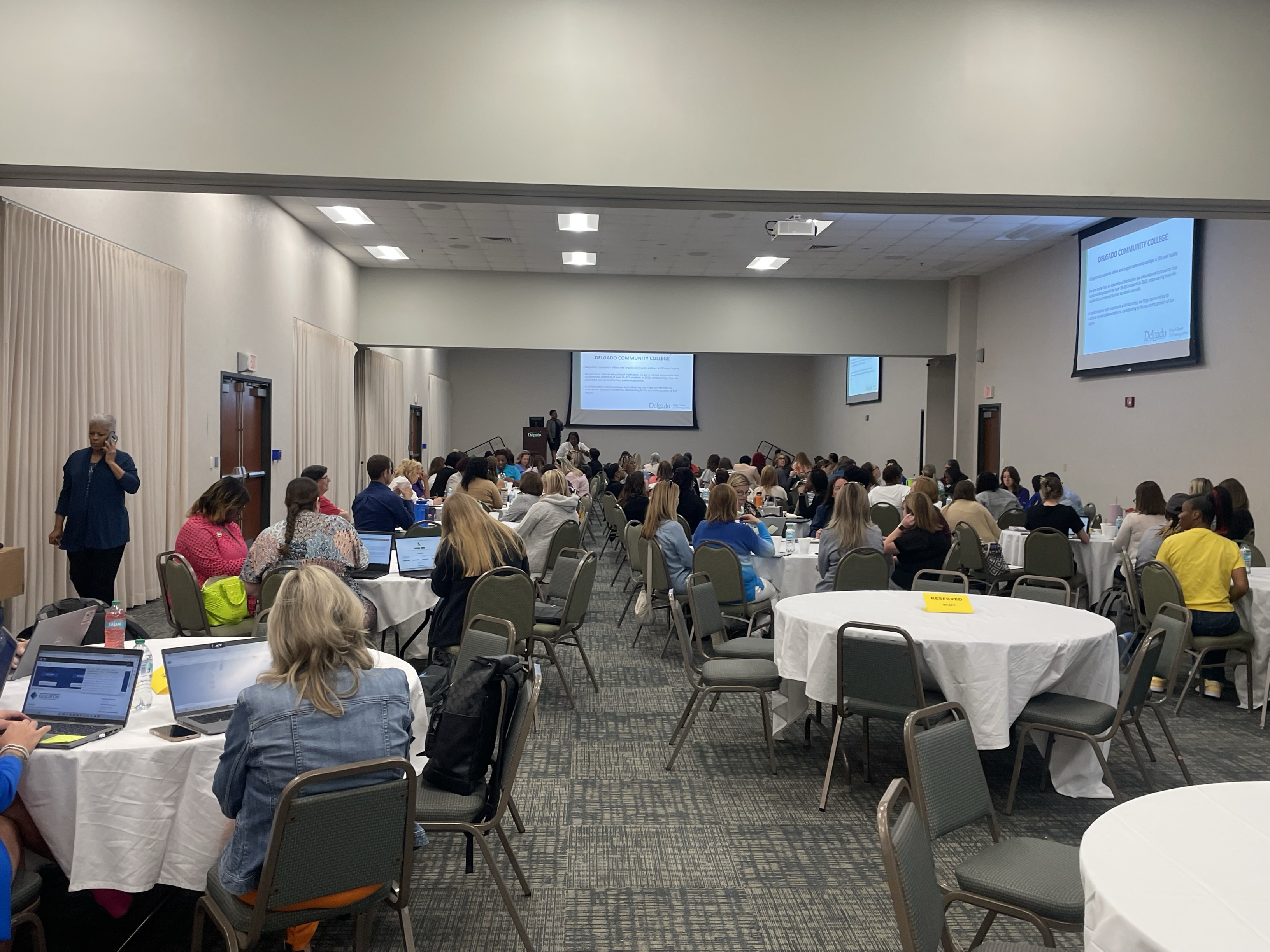 Attendees watching a presentation