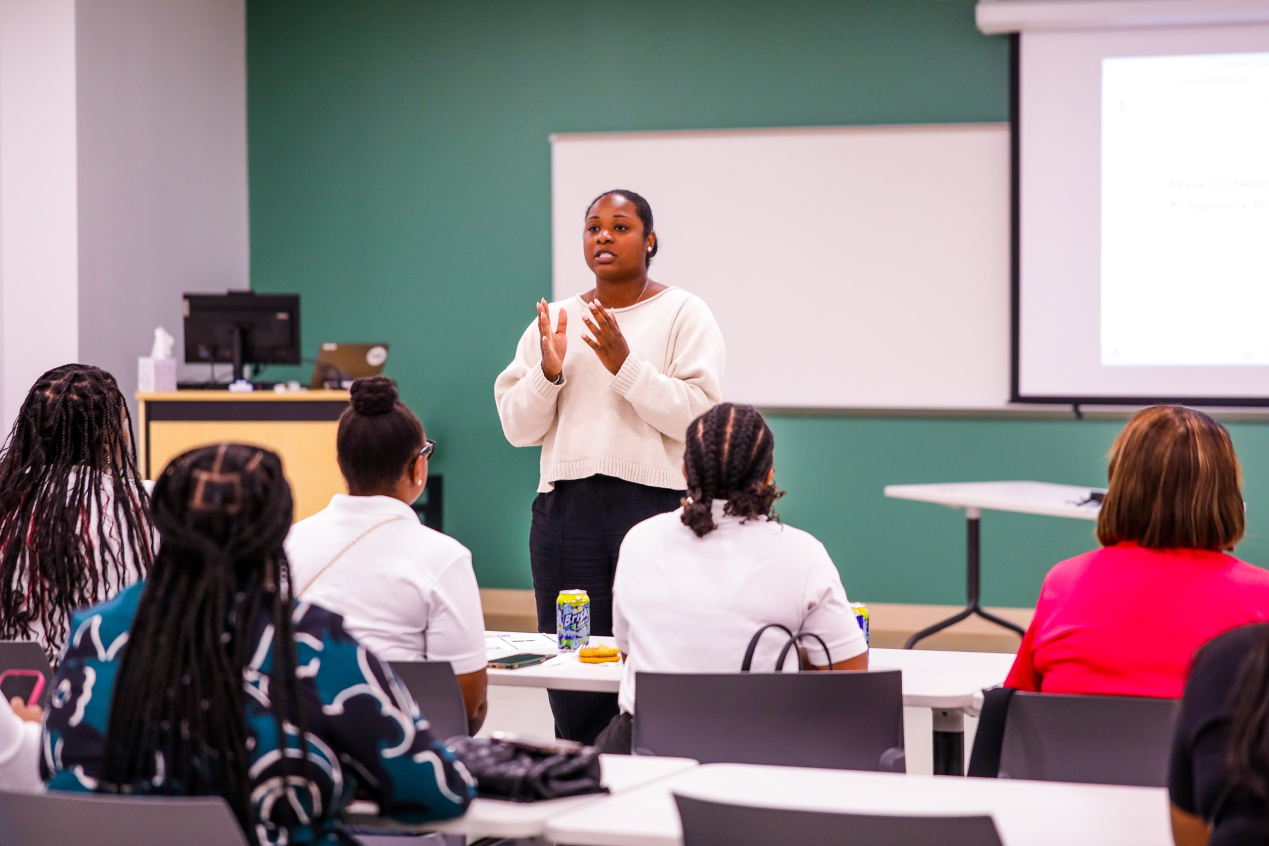 person speaking in a seminar