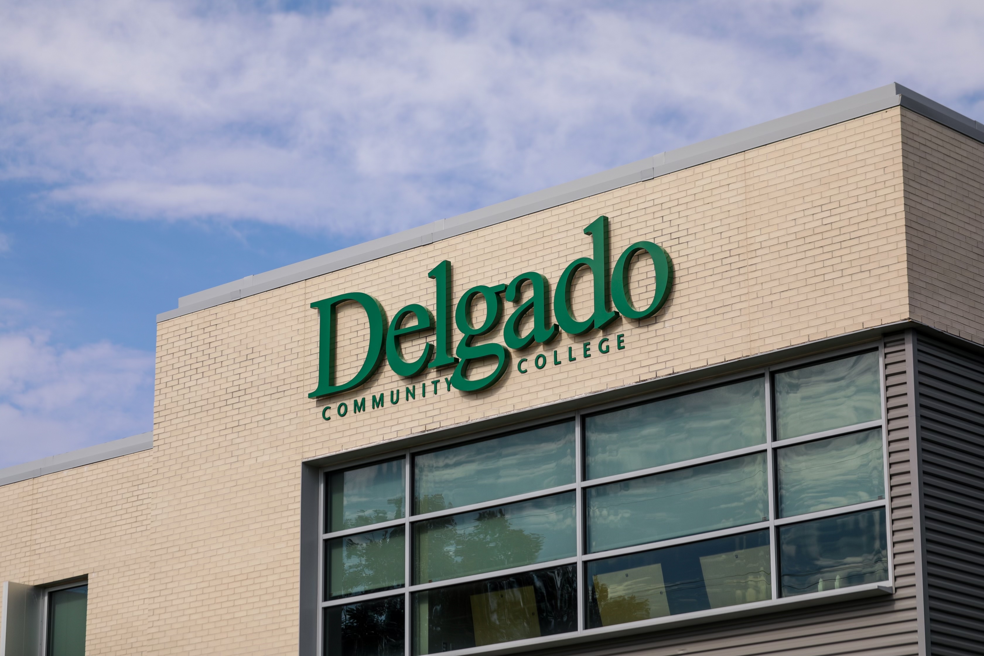 Delgado logo sign on the Advanced Technology Center on the West Bank Campus
