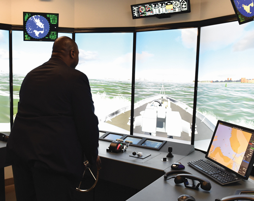 student practicing on the maritime simulator